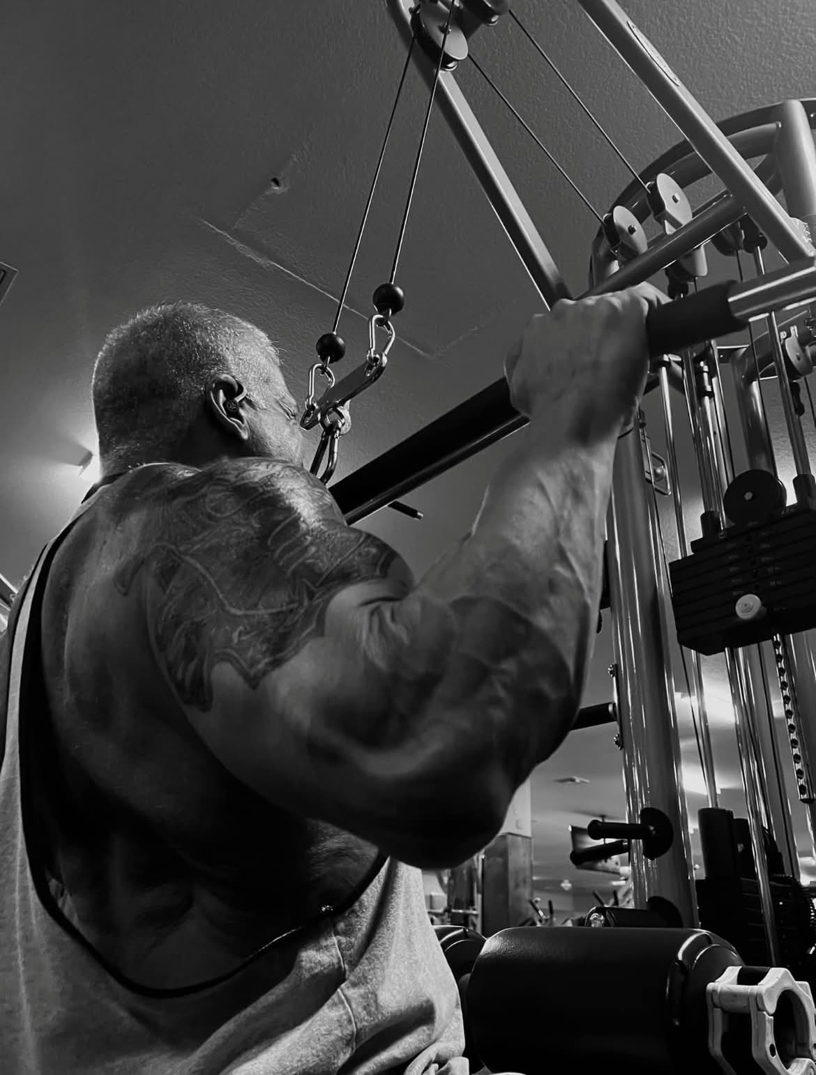 Dr. Cabrera displaying muscle definition and conditioning